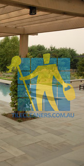 Brisbane/Moreton Bay Region/Rothwell bluestone tiles outdoor around contemporary pool light copping