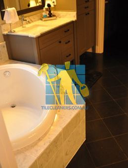 traditional bathroom with black granite tiles on the floor Sydney/Northern Beaches/Fairlight