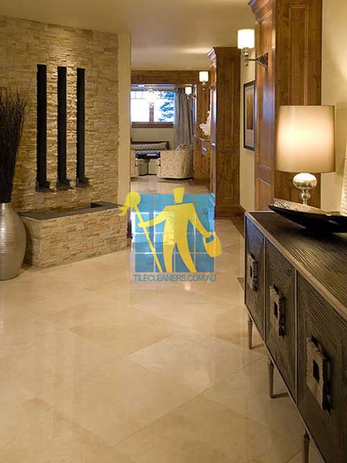Gould Creek home with shiny limestone tile floor
