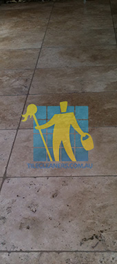 limestone tiles outdoor walkway dirty grout lines regular pattern