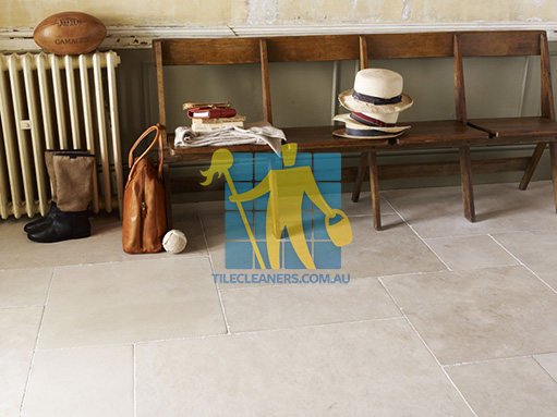 limestone tile sample storm tumbled white grout wooden chair