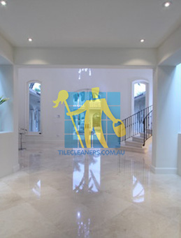 contemporary entry with crema marfil marble tiles on floors Gold Coast/Numinbah Valley
