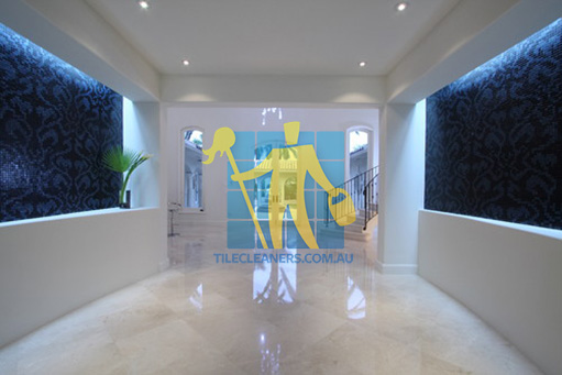 Eaton contemporary entry with crema marfil marble tiles on floors