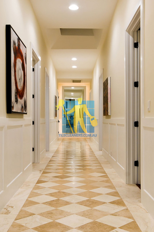 Casuarina marble tiles in hallway with traditional design pattern different colors 