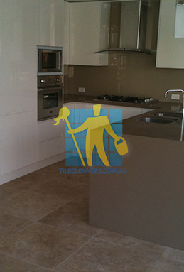 kitchen with clean porcelain floor tiles after cleaning by tile cleaners Brisbane/Moreton Bay Region/Beachmere
