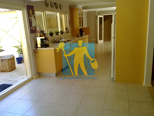 porcelain tiles floor inside furnished home after cleaning kitchen floors