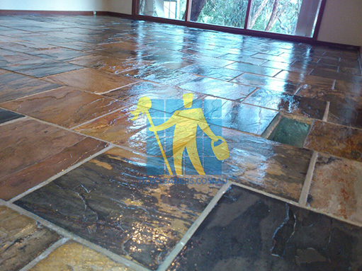 Newtown slate tiles squares close shot after sealing with color enhancer sealer shiny floors