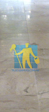 close shot of travertine tiles in large empty livingtoom large tiles after cleaning Sydney/Western Sydney/Penrith
