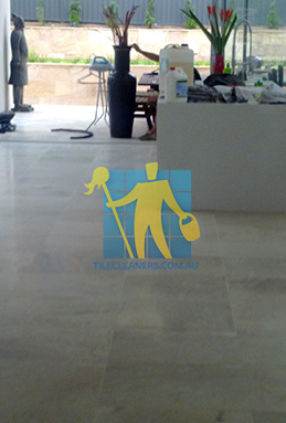 travertine tiles in large empty livingtoom large tiles after cleaning by tile cleaners Perth/Cambridge