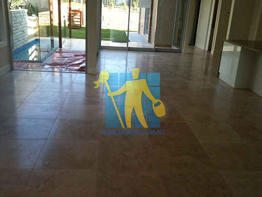 empty room of travertine tiles in large empty living room large tiles after cleaning Melbourne