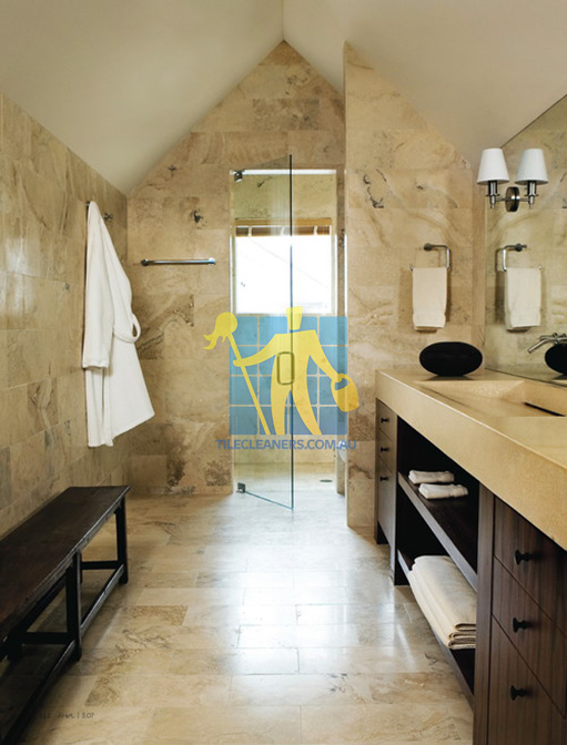 travertine tiles bathroom floor wall shower with dark veining Northern Beaches