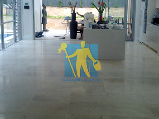 travertine tiles in large empty living room large tiles after cleaning by tile cleaners Northern Suburbs