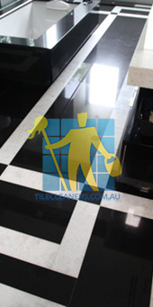 absolute black granite slab floor with white quartzite bands Gold Coast/Tile Cleaning Woongoolba