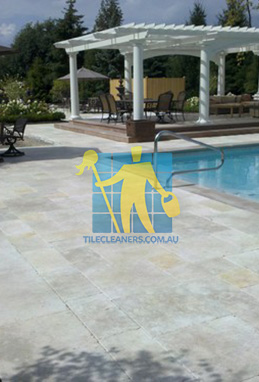 paving stone tumbled marble with bluestone coping traditional pool Adelaide