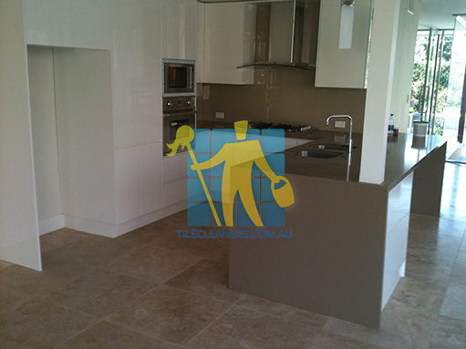 Tighes Hill kitchen with clean porcelain floor tiles after cleaning by tile cleaners