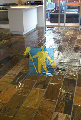 shiny floor with slate tiles after sealing still looking wet dark regular shape and size Canberra